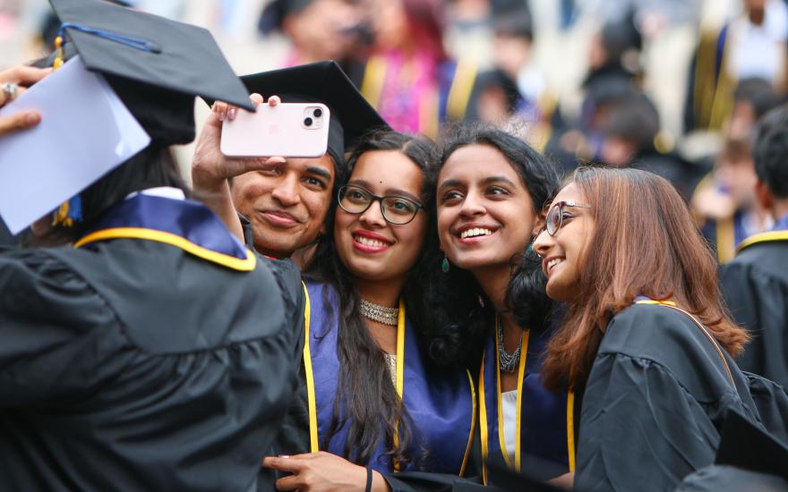 Students take a selfie at one of UC Berkeley's inaugural College of Computing, Data Science, and Society commencement ceremonies. (Photo/ Kayla Sim, UC Berkeley College of Computing, Data Science, and Society)