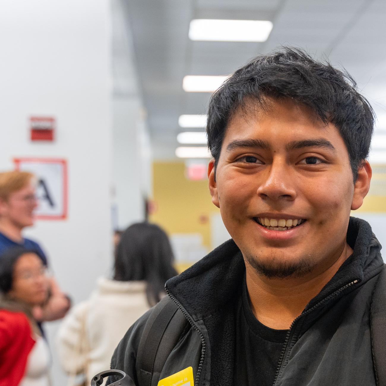 Student holding a water bottle