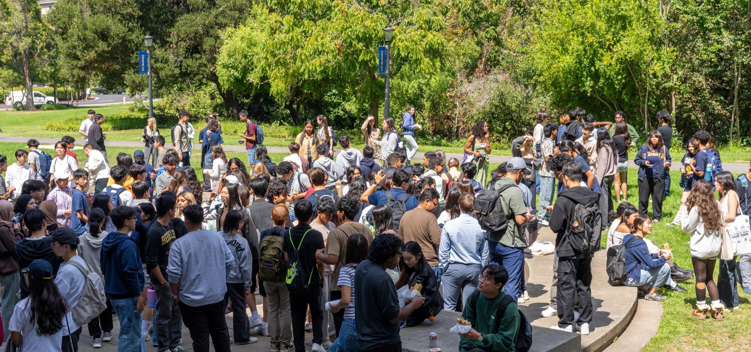 crowd of students at an outdoor campus event