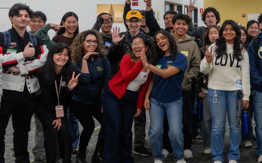 Spring 2025 Data Scholars pose with cheers at Scholars First welcome event